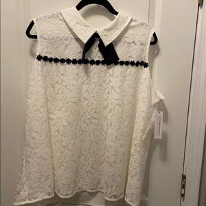 White and black sleeveless lace blouse